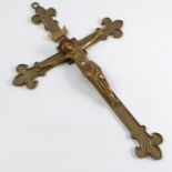 A gilt metal wall hanging crucifix, height 15ins