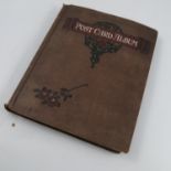 A postcard album, containing approximately 152 pic