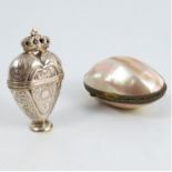 An Antique Dutch silver box, of heart form with crown over and raised on a circular pedestal foot,