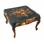 A 19th century rectangular shaped stool, raised on