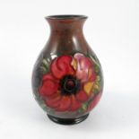 A Moorcroft Pottery vase, decorated in the Anemone