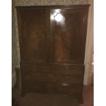 A 19th century mahogany linen press, having two pa