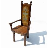 An unusual Arts and Crafts style armchair, with st