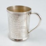 A Victorian silver christening mug, with engraved decoration of ferns and flowers, with bead edge,