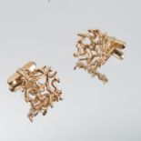 A pair of 9 carat gold cufflinks, cast as an open work abstract design, London 1970, maker P P &