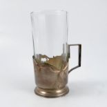 A Russian silver tea glass holder, with piercing and engraved with flowers, engraved with