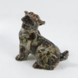 A Royal Copenhagen model, of a seated dog, in a br