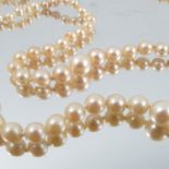 A two row graduated cultured pearl necklace, the 85/87 pearls of approximately 3-6.9mm diameter,