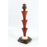 An Art Deco style lamp base, the column formed as