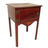 A late 19th century mahogany bedside cupboard, wit