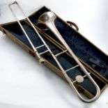 A Pan America Elkhart USA trombone, with chrome finish, cased