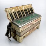 A Cooperativa L'Armonica Stradella de luxe piano accordion, in a marbled white case, cased