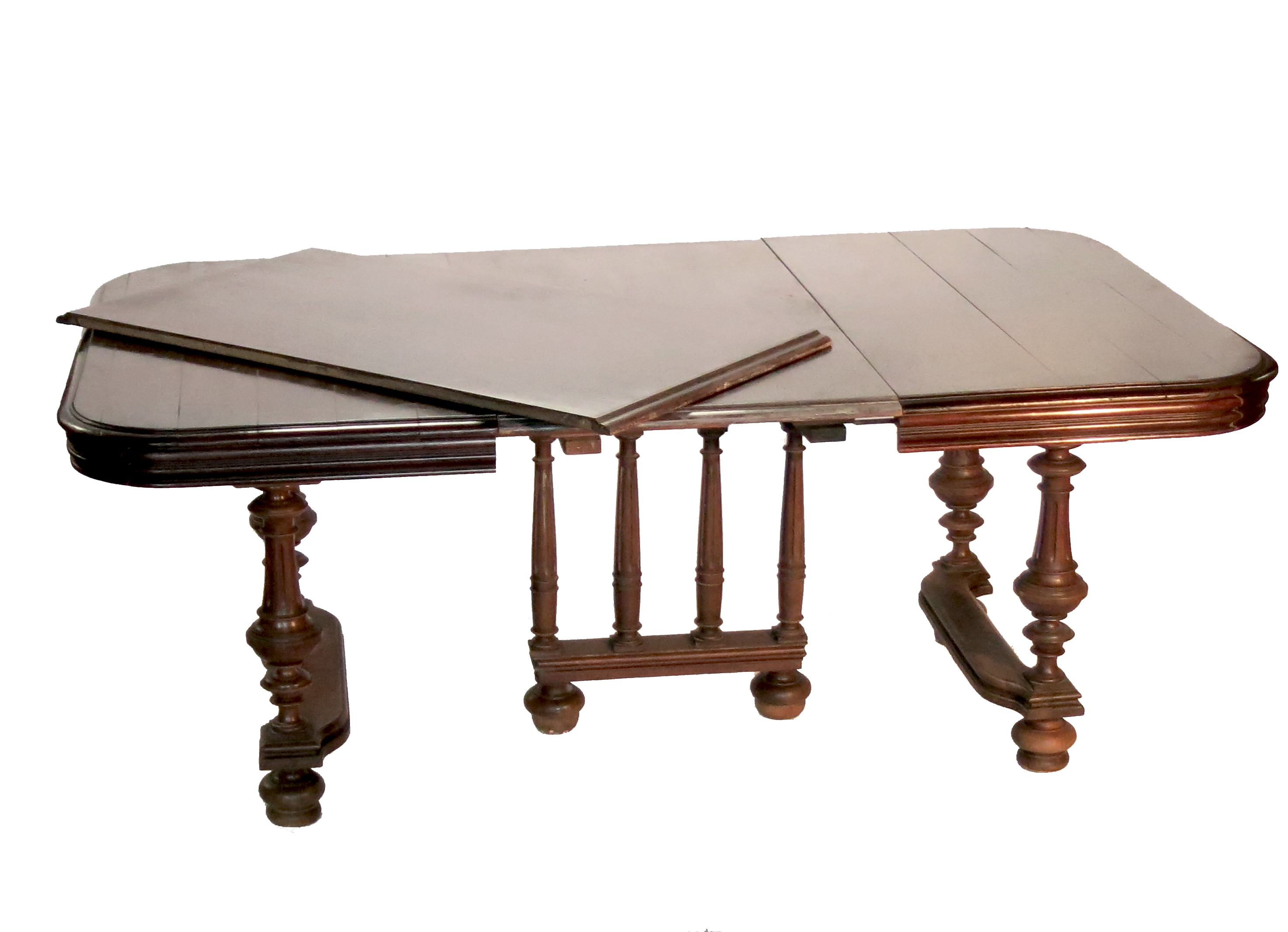 A continental style extending dining table, with t