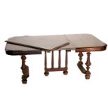 A continental style extending dining table, with t