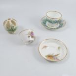 A Royal Worcester breakfast cup and saucer, painte