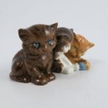 A Royal Worcester figure group of three kittens, b