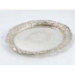 A continental white metal oval tray, with embossed and pierced edge, engraved to the centre,