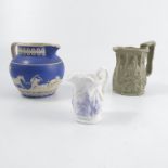 Three Victorian relief-moulded jugs, comprising on