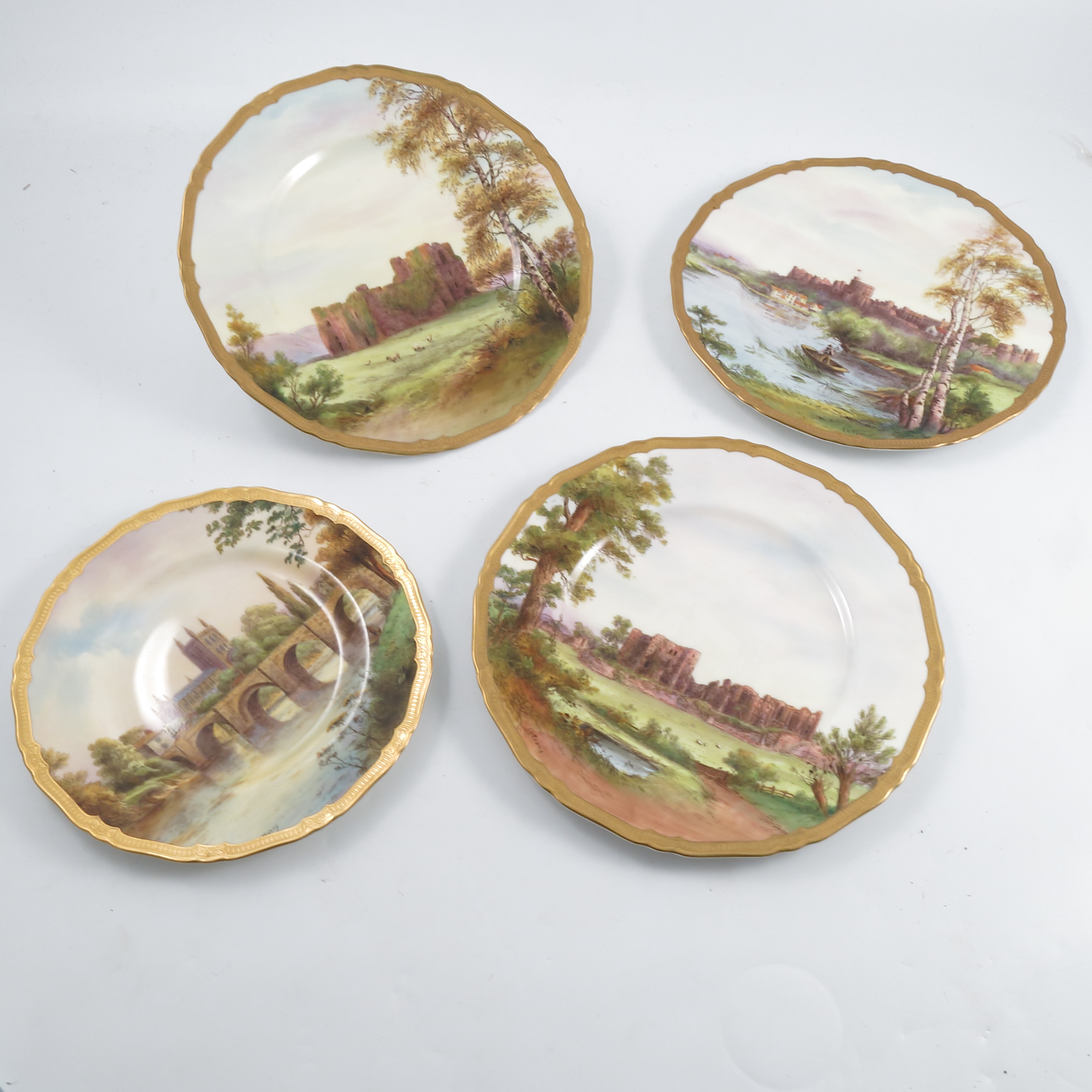 Four Royal Worcester printed painted wall plates,