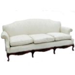A three seater settee, raised on carved cabriole legs, width 74ins