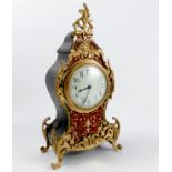 A late 19th century boulle mantle clock, with reed