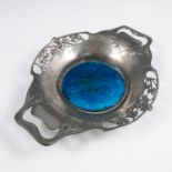A Liberty pewter and enamel dish, of shaped oval form, the edge pierced with clover leaves,