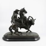 A spelter model, of a bullfighter mounted on a rearing horse with bull, on ebonised oval base,