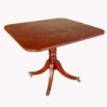 A 19th century style mahogany square topped occasional table, raised on a turned column with four