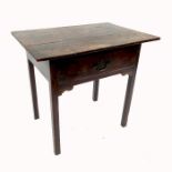 An antique oak side table, fitted with a frieze drawer raised on square legs, width 30ins, depth