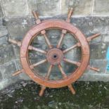 A ships wheel, with metal centre, diameter 41.5ins