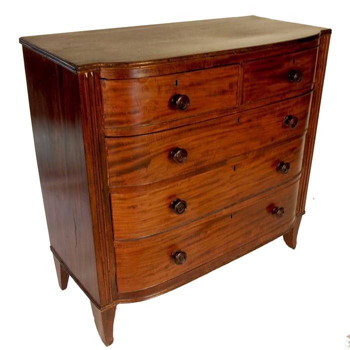 An early Victorian break bow front mahogany chest, of two short over three long drawers, width