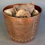 A circular copper log bin, diameter 19ins