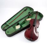 A cased violin, the case and violin bearing label for the Maidstone School Orchestra Asstn.