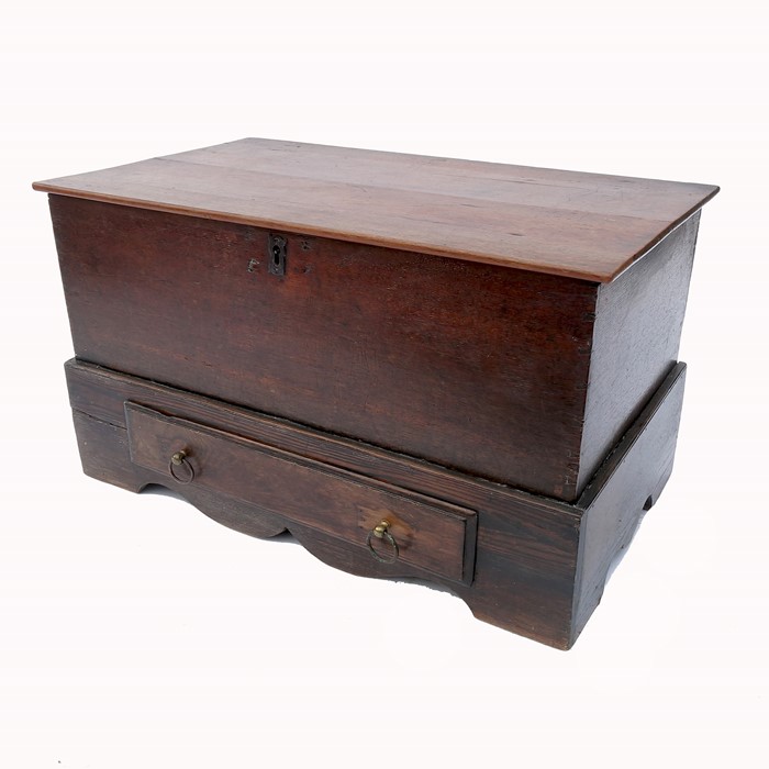 An antique oak coffer, having rising lid over a single drawer, width 33ins, height 19ins, depth