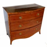 A late George III mahogany chest of drawers, with boxwood stringing and cross banded top, fitted