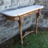 A gilt wood console table, with white marble top, the base decorated in the Classical style, width