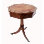 A Georgian design octagonal occasional table, fitted with a drawer, raised on a turned column