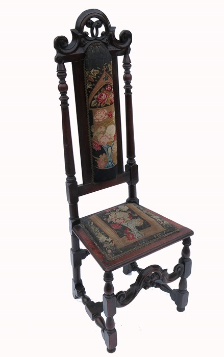 An antique style hall chair, with upholstered back and seat, raised on turned legs united by H