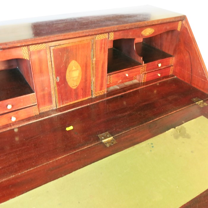 A George III mahogany bureau, the crossbanded fall flap opening to reveal a fitted interior, over - Image 2 of 2
