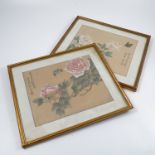 A pair of Oriental colour prints, on silk, of flowers and butterflies, with character marks, 13.5ins