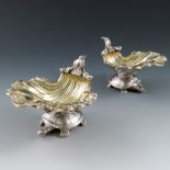 A pair of George III silver and gilt shell sweetmeat dishes, the gilt wash shell decorated with