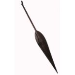 A Polynesian spear paddle, of broad leaf form, with carved decoration, height 65ins