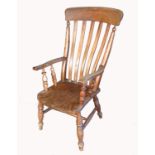 A 19th century lathe back Windsor armchair