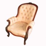 A 19th century mahogany show wood grandfather's chair, with carved front cabriole legs