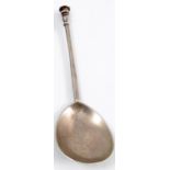 An Antique white metal seal top spoon, with engraved initials to the top, length 6.5ins