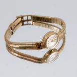 Smiths, a lady's 9 carat gold mechanical bracelet watch, 16g gross excluding movement, original box