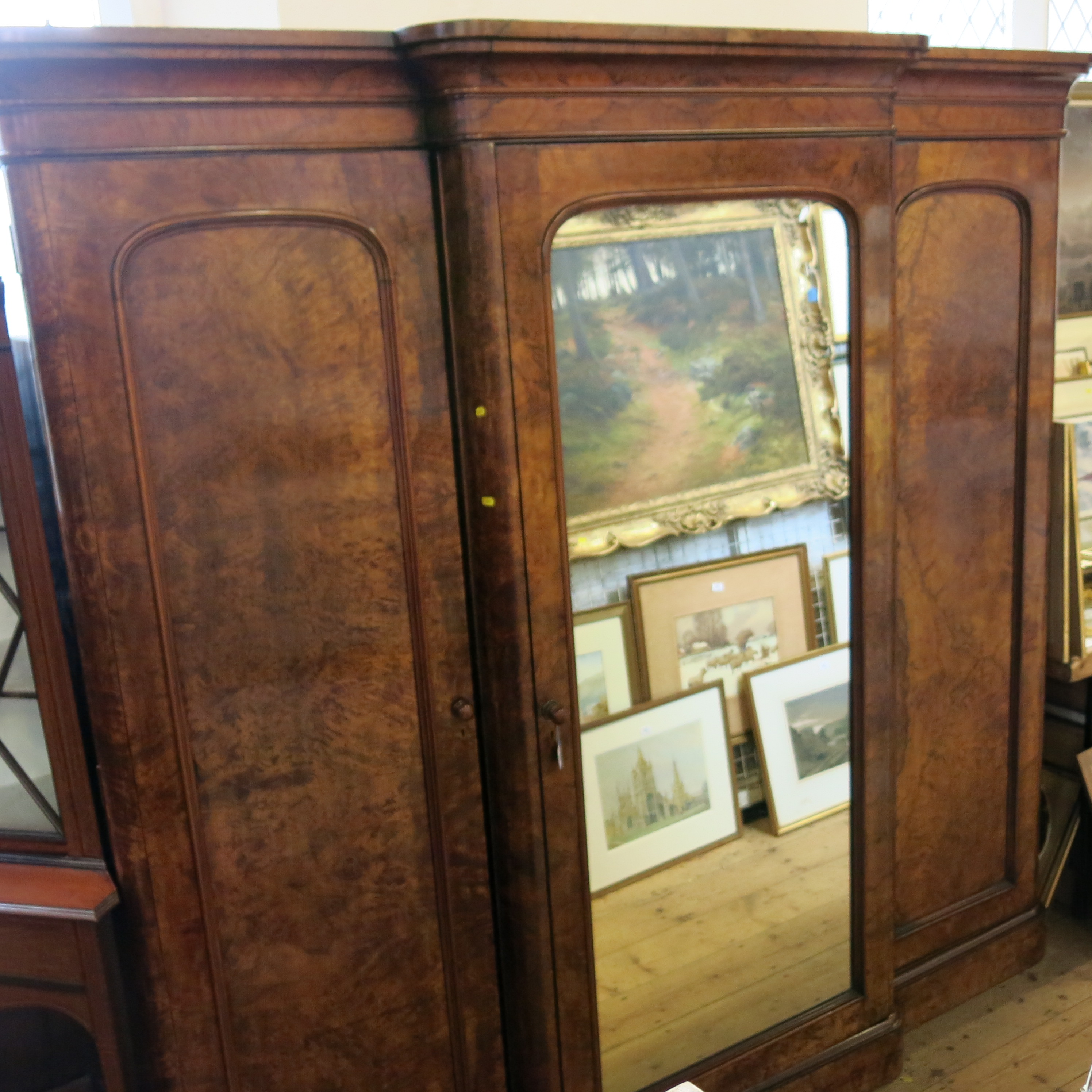 A Victorian burr walnut compactum, the central section fitted single mirror door opening to reveal - Image 2 of 2