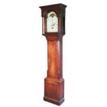 A 19th century oak longcase clock, fitted single door flanked by chamfered reeded decoration, the