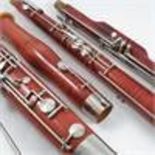 A Boosey and Hawkes Artia bassoon, cased, together with spare reed, cleaning brushes and tutor