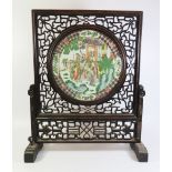 An Eighteenth Century Chinese Famille Verte Table Screen the circular panel decorated with scene